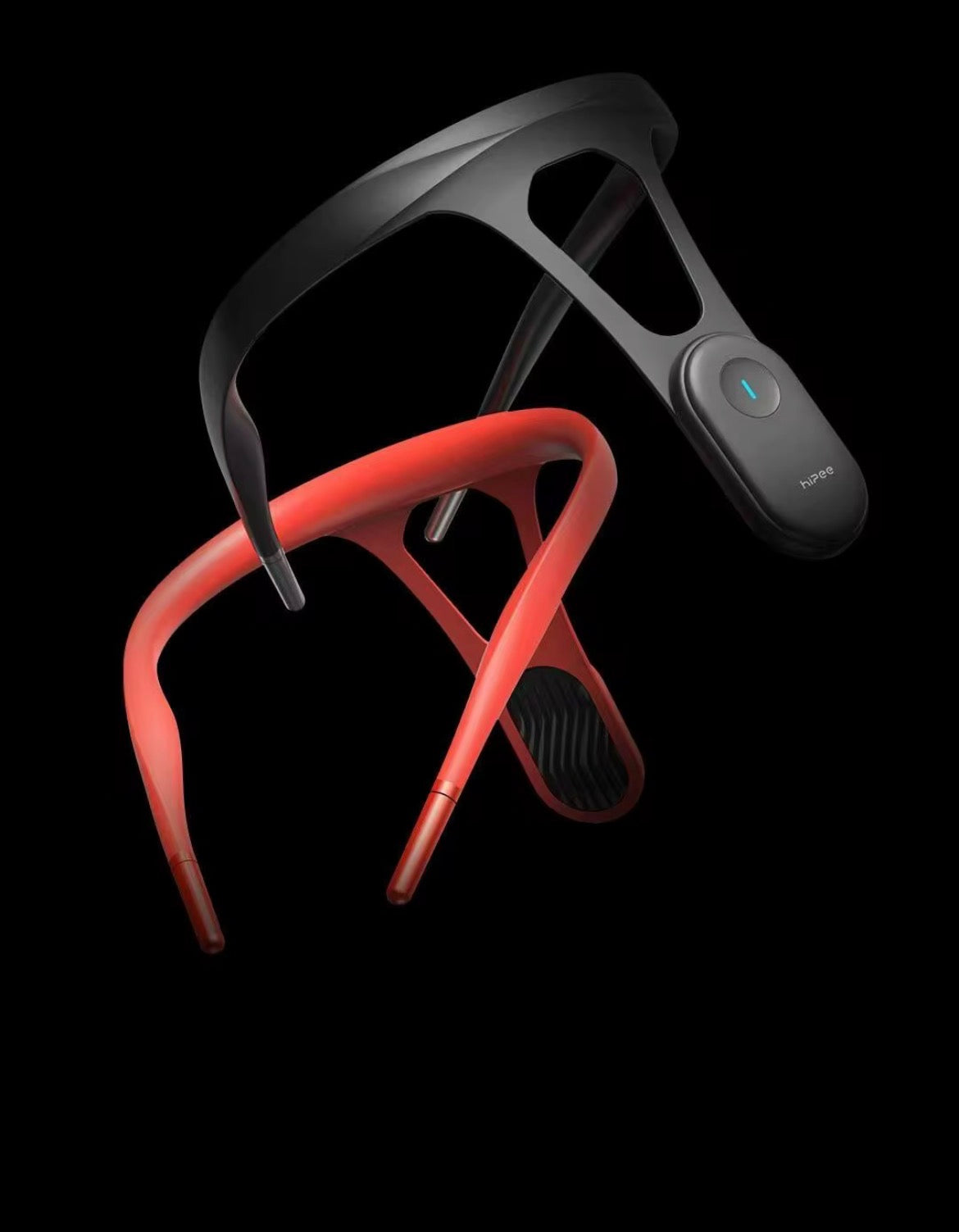 Black and red eyeglasses with a remote control on a black background